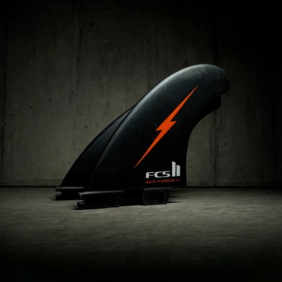 FCS2 x Nathan Florence | NF Athlete Series Accelerator PC Large Tri Fin Set. Black/Red Bolt