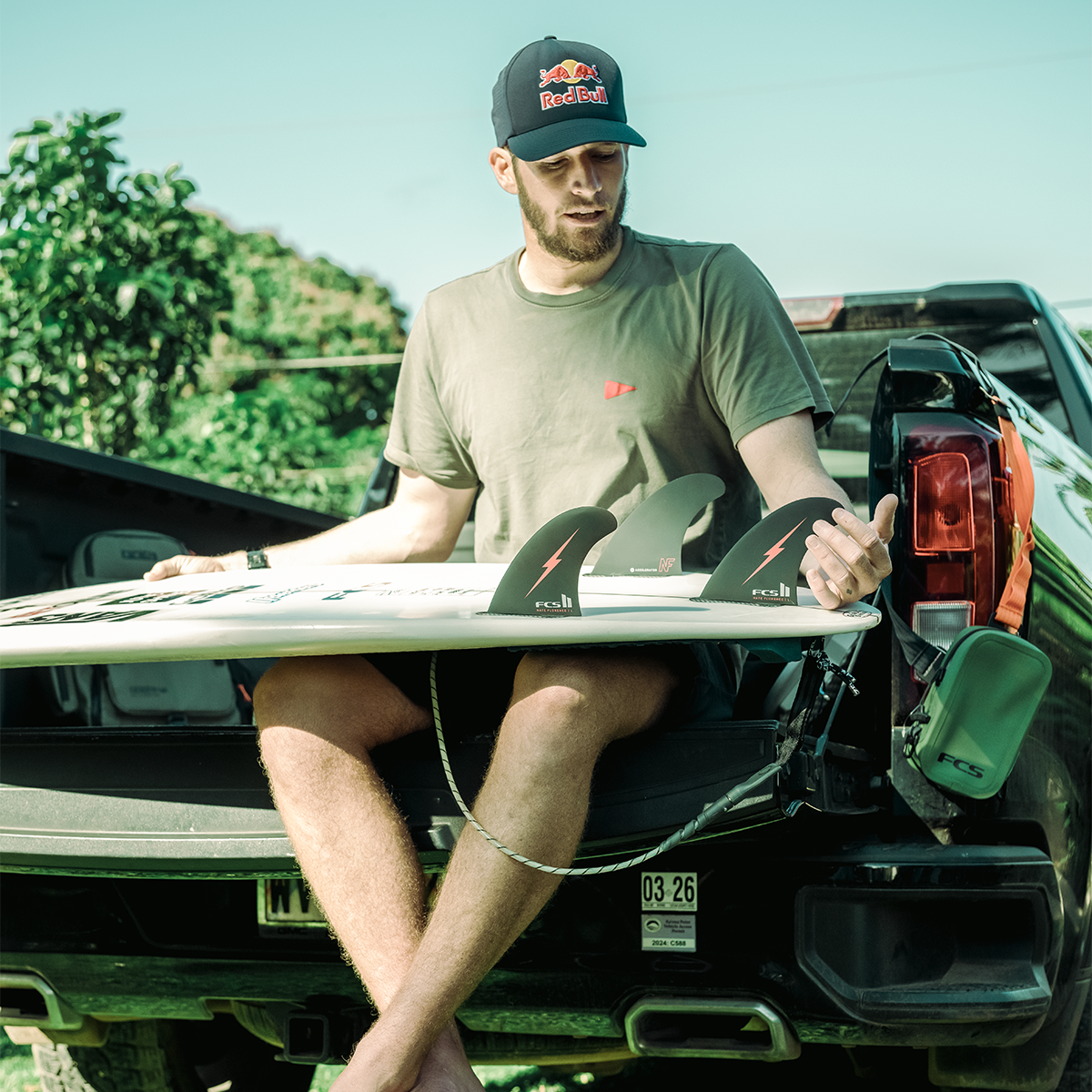 FCS2 x Nathan Florence | NF Athlete Series Accelerator PC Large Tri Fin Set. Black/Red Bolt