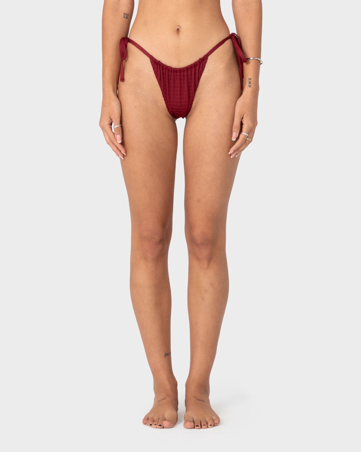 Rusty | Ladies Cedar Side Tie Cheeky Bikini Bottom. Cranberry