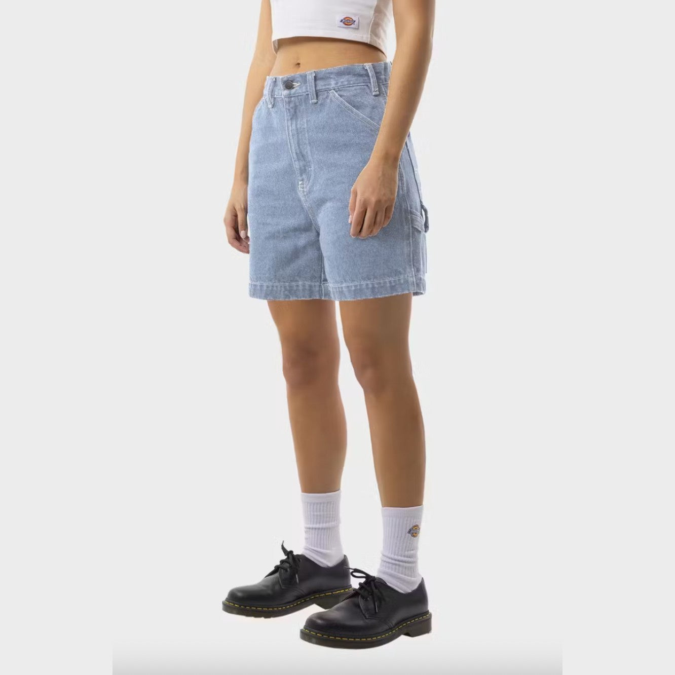 DICKIES | LADIES 1997 DENIM A LINE CARPENTER SHORT. LIGHT WASH BLUE